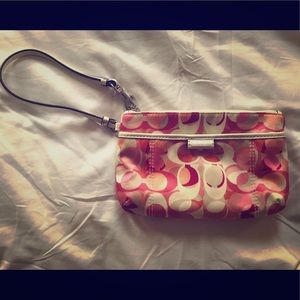 Never been used genuine Coach wristlet purse